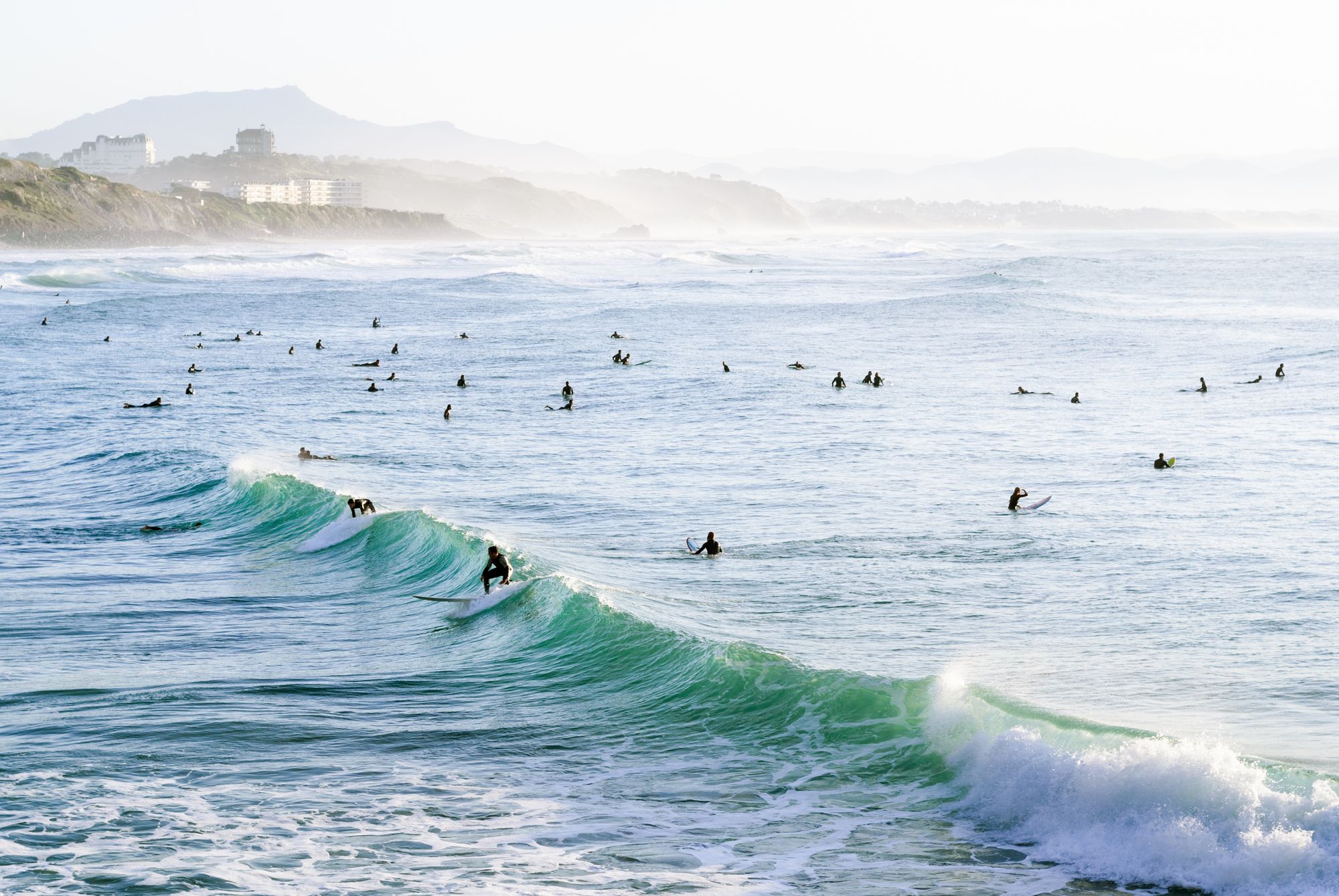 beginner surfers at a beginner surf spot in biarritz france