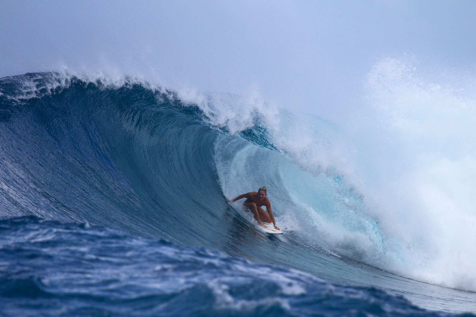 Amy Kotch getting tubed in the Maldives, one of the best surf destinations in August
