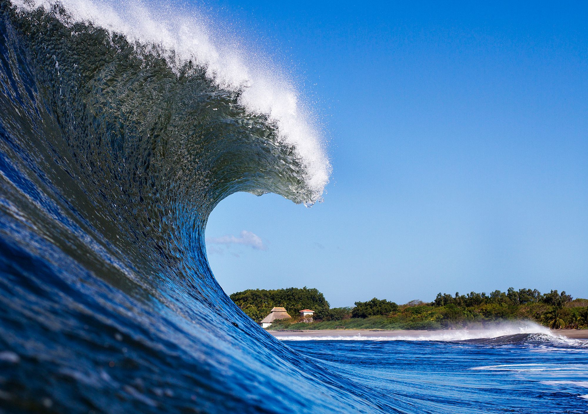 looking into a righthand tube in Nicaragua, one of the best surf spots in June