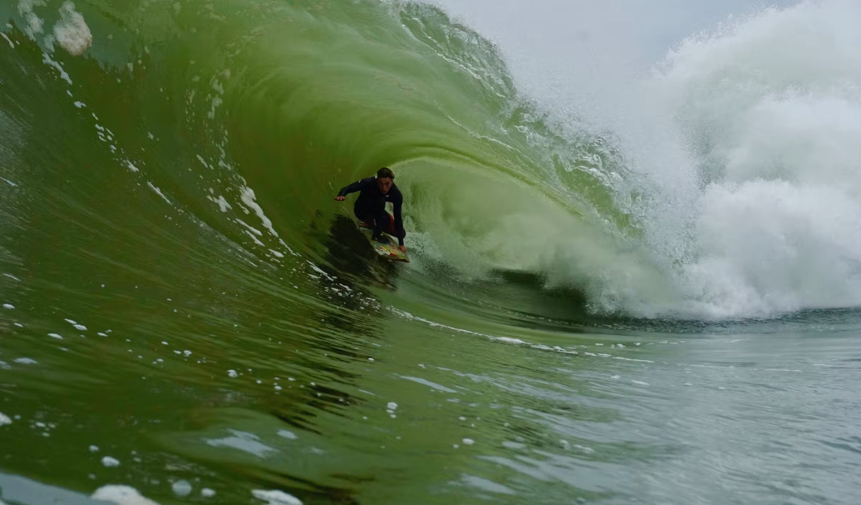surfer getting barreled in Northern Chile, one of the best surf destinations in August