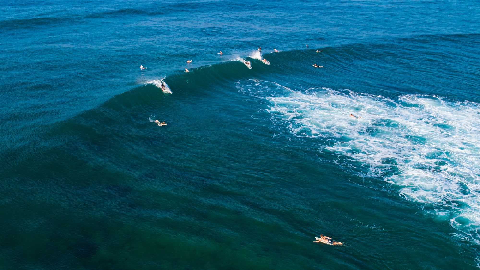 surfers in Sri Lanka, one of the most cheap surf destinations